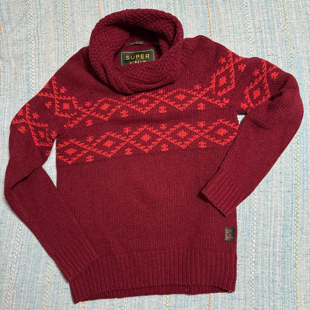 Style meets warmth with Scotch & Soda tube/turtle neck sweater.